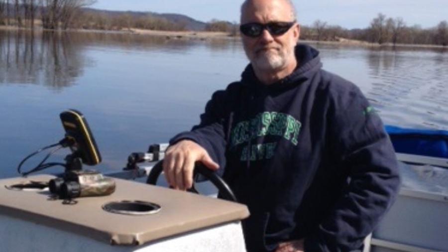 Picture of Dr. Ken Lubinski on a boat